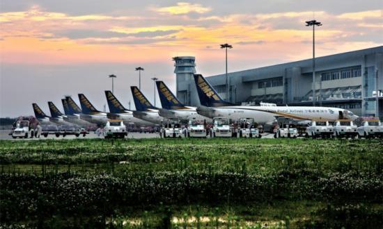 快递业空战升级 唯品会联合奥凯航空自购货机